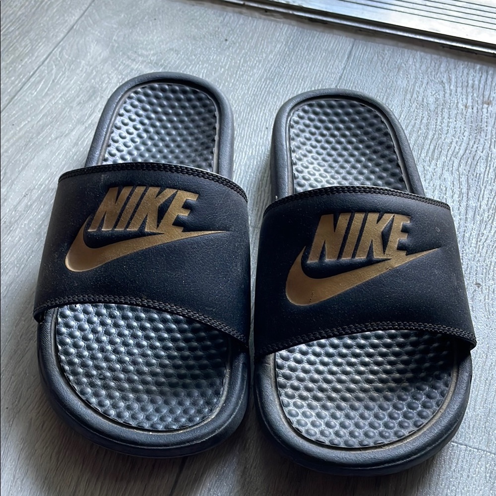 Nike Black and Gold Slippers Comfortable Slip-On Design